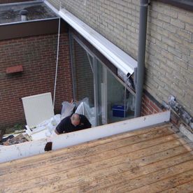 Oude dakbedekkingen slopen